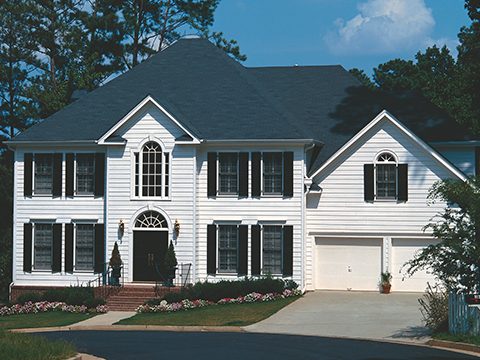 House with white, wide vinyl siding